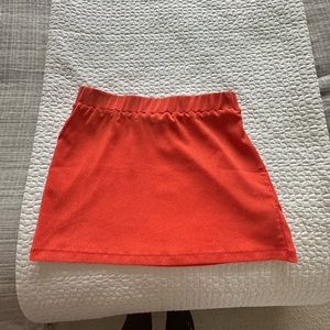 Bright orange mini skirt